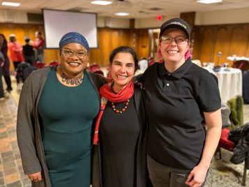 Dominique Canning, Marlyse Baptista, and friend of the department