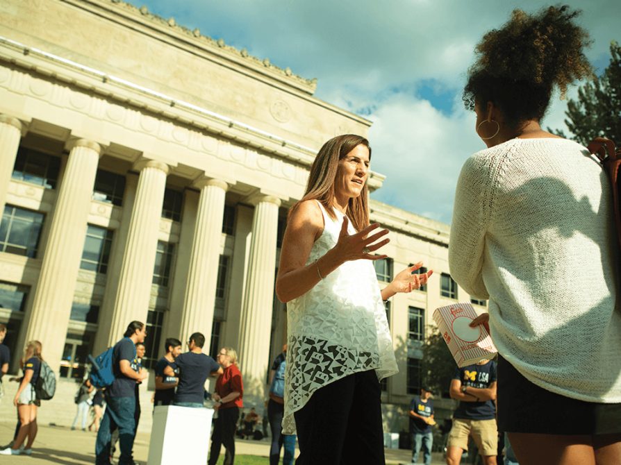 LSA Dean Anne Curzan talks with a student.