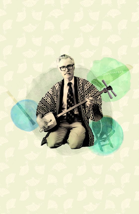 Professor William P. Malm is sitting on the floor wearing traditional dress and playing an instrument