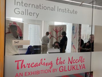 Threading the Needle sign at the II Gallery
