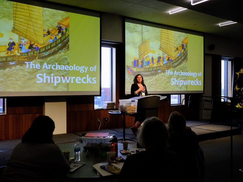 Rory Walsh, archaeologist/anthropologist and manager of the master's programs at the U-M Department of Ecology and Evolutionary Biology,  presents to the teachers 