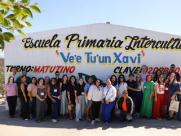 teacher workshop participants gather in front of the Indigenous elementary school in Mexico 