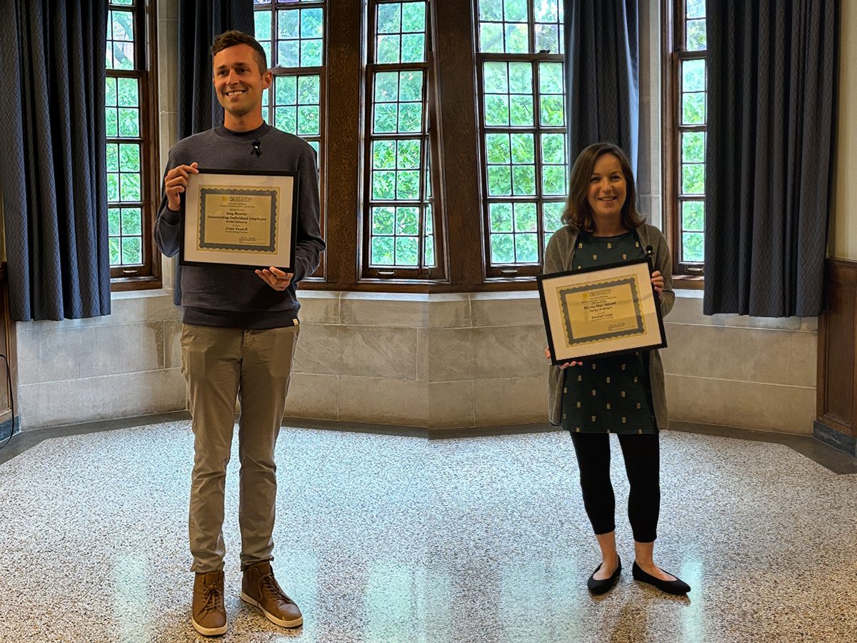 Evan Vowell (L) and Rachel Levy (R) pose with their awards.