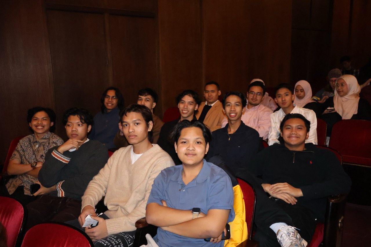 Audience members enjoying the event.
