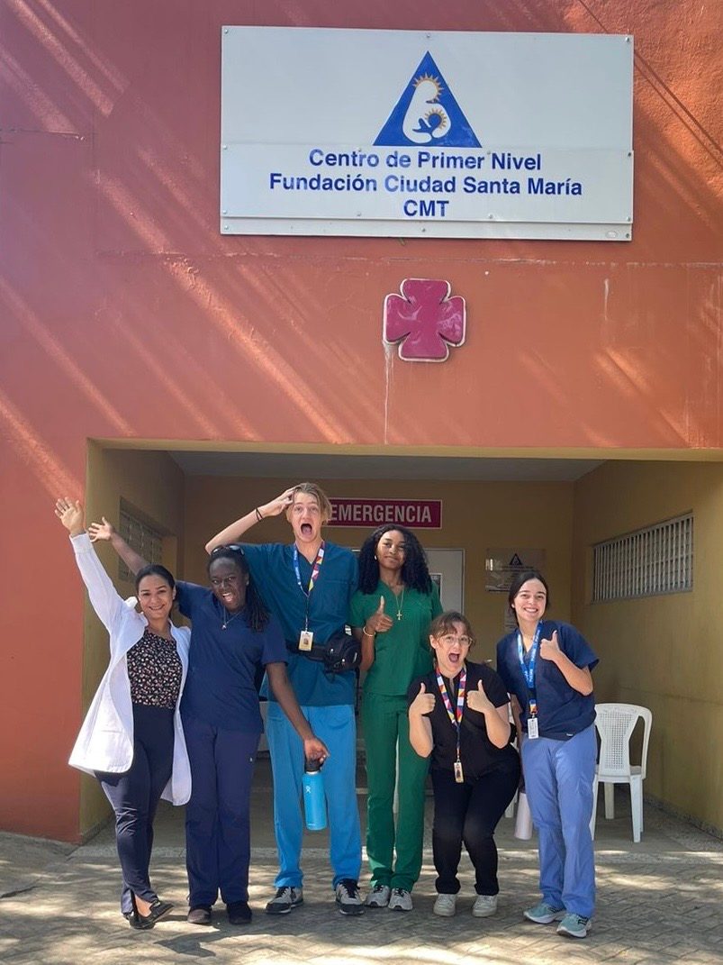 Erin with classmates at their second clinical rotation