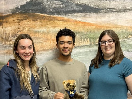 Left to right: Caitlin Hagen and Isaiah Crawford, Winter 2024 Charles University study abroad students, and Senior Study Abroad Advisor Callie Rouse pose for a picture at the UPCES Center.