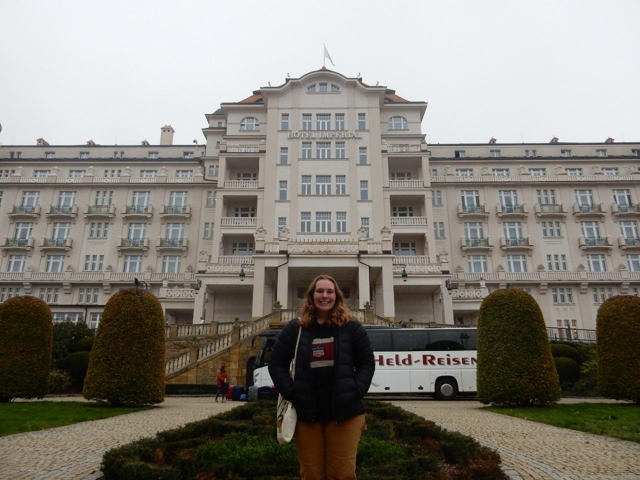 Nadia poses for a photo outside the impressive Hotel Imperial in Czechia.