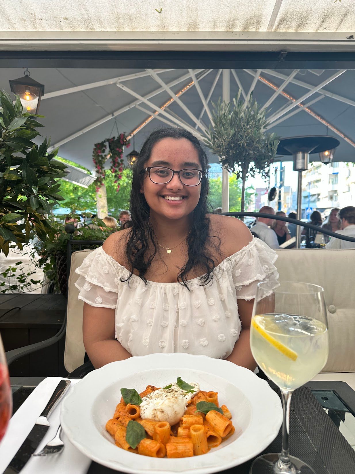 Prema having a meal at a restaurant
