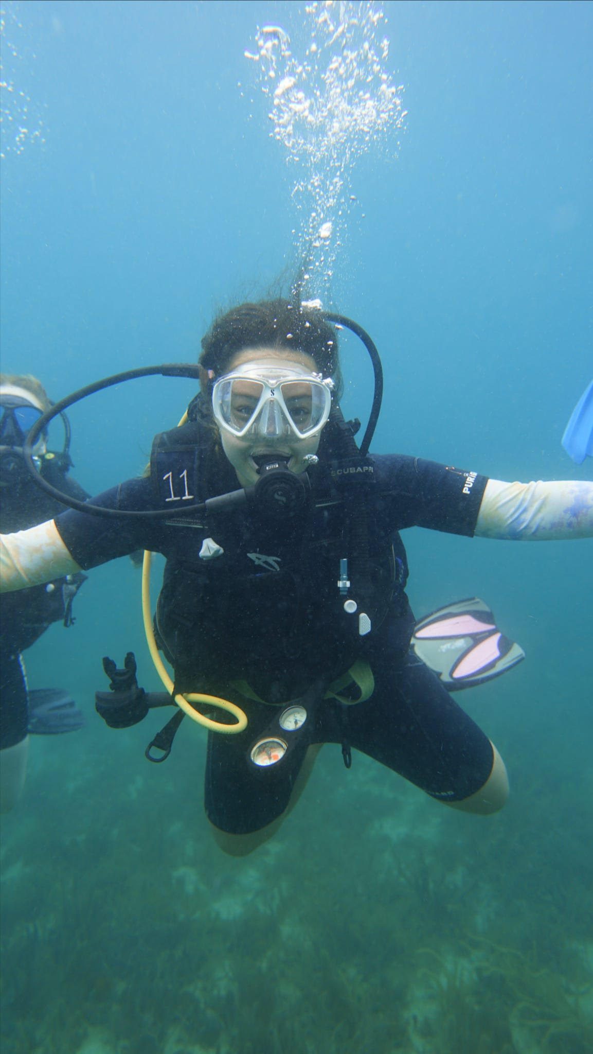 Alina Malin underwater in scuba gear