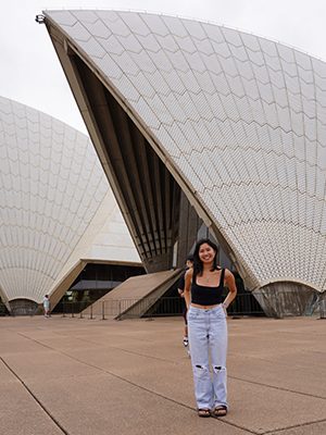 Emily posing in front of the Sydney Opera House