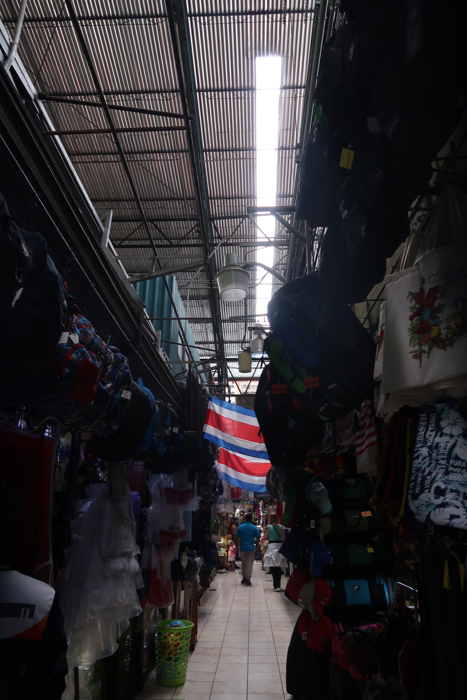 image of a crowded store aisle with Costa Rica flags
