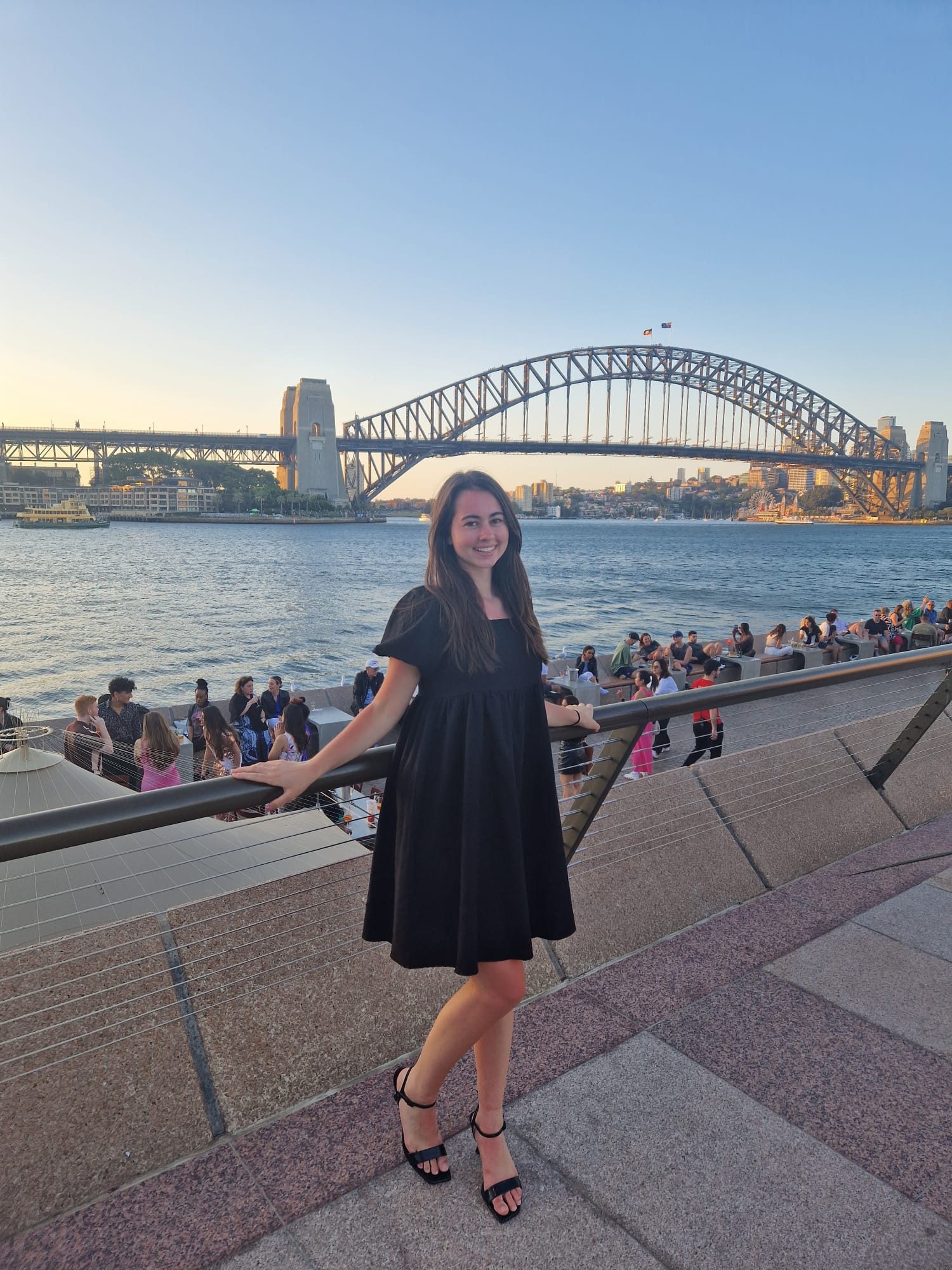 Mandy posting in front of the Sydney Harbour Bridge