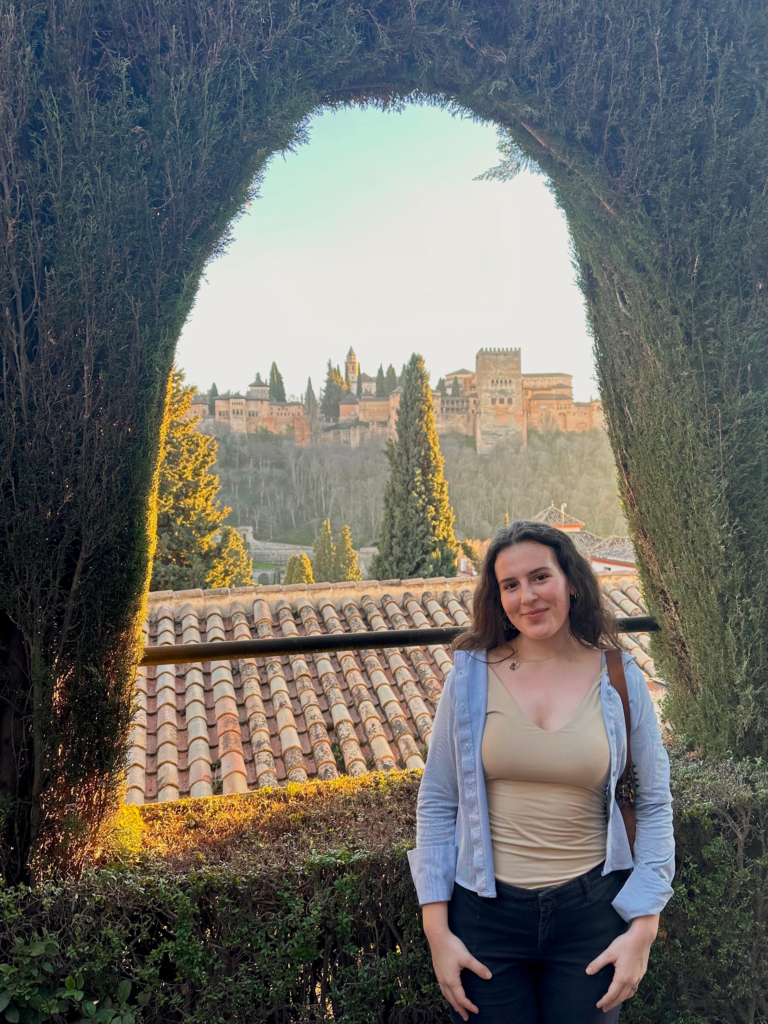 Natalia Dussán with a view of the Alhambra in Granada, Spain