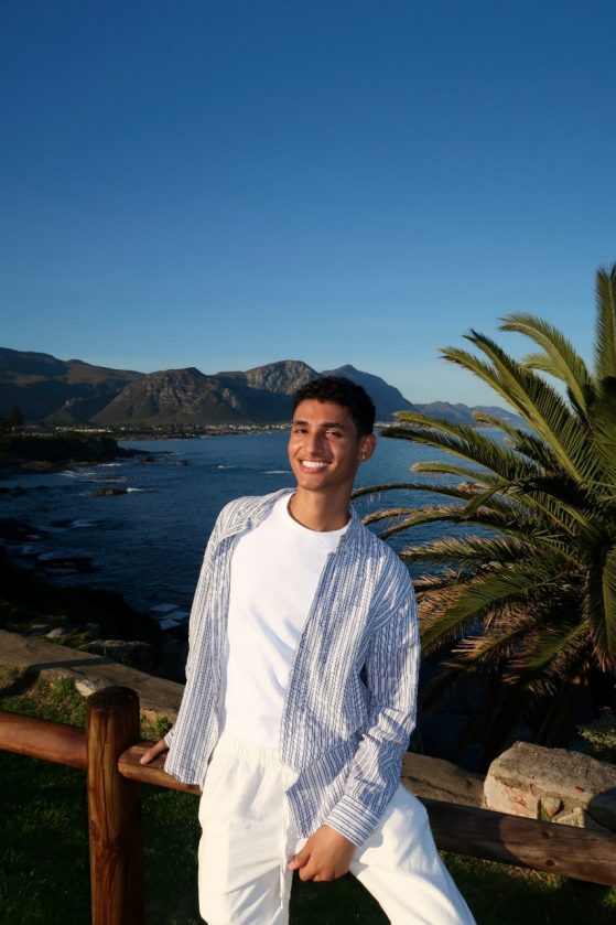Student sitting in front of nature in South Africa