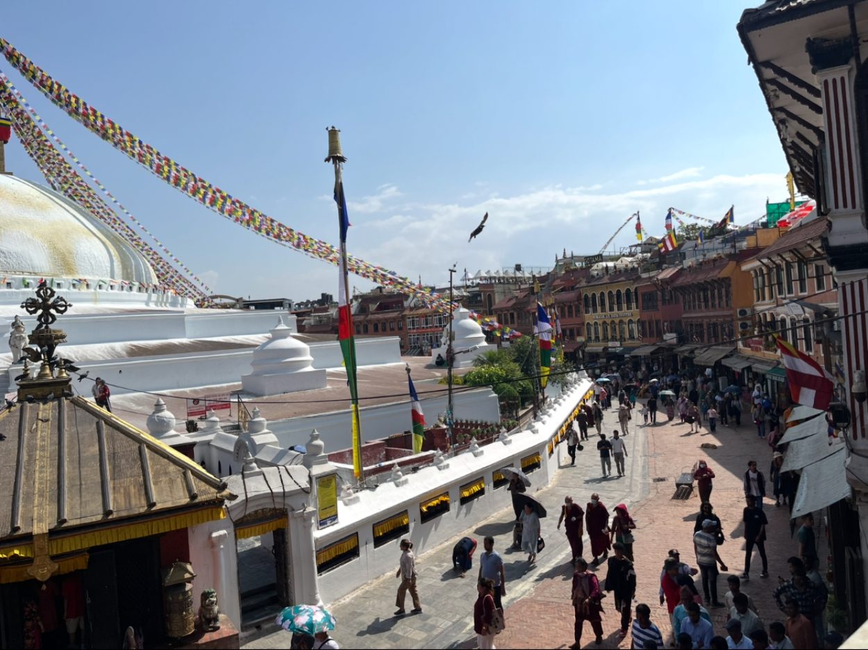 The view of the busy streets around the Boudhanath Stupa from the monastery