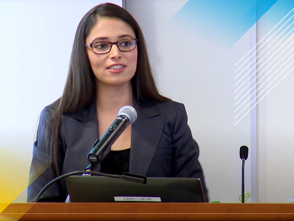 2018 Collegiate Fellow Angela Ocampo speaking at a podium