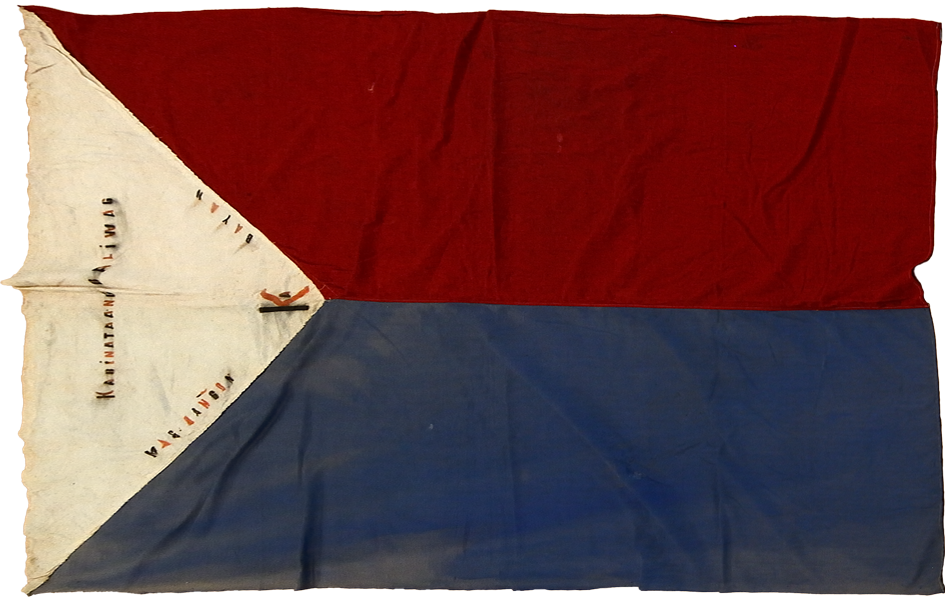 An antique alternate Filipino flag, with the red stripe on top and the blue stripe on the bottom, with Tagalog words stitched on the white triangle at the center of the flag.