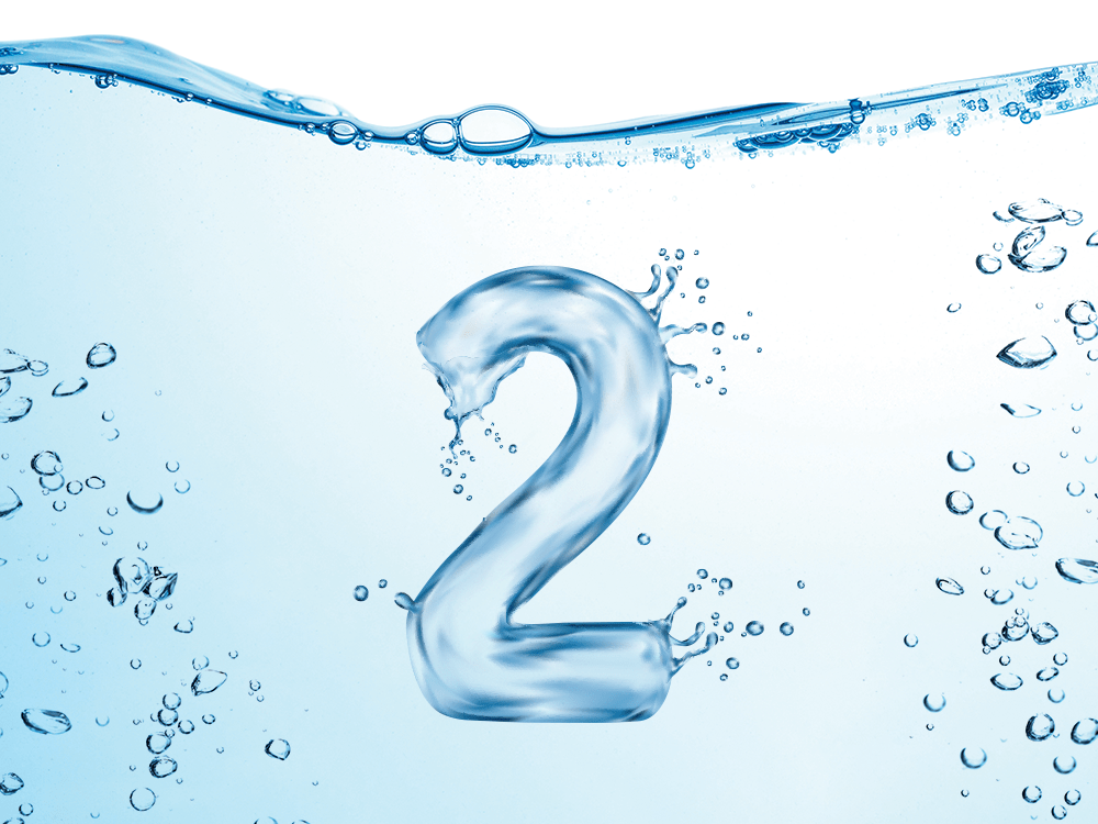 A stylized numeral 2 and a photo of the surface of water and bubbles in the water.