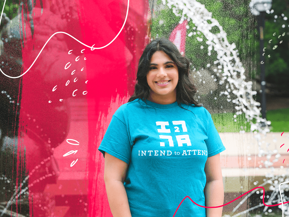 A female college student poses in front of a fountain on the University of Michigan campus. Drawings in red and white are woven into the photo.