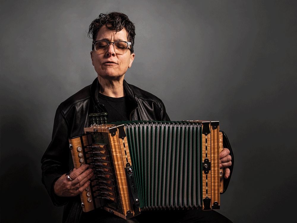 Nadine Hubbs plays the accordion.