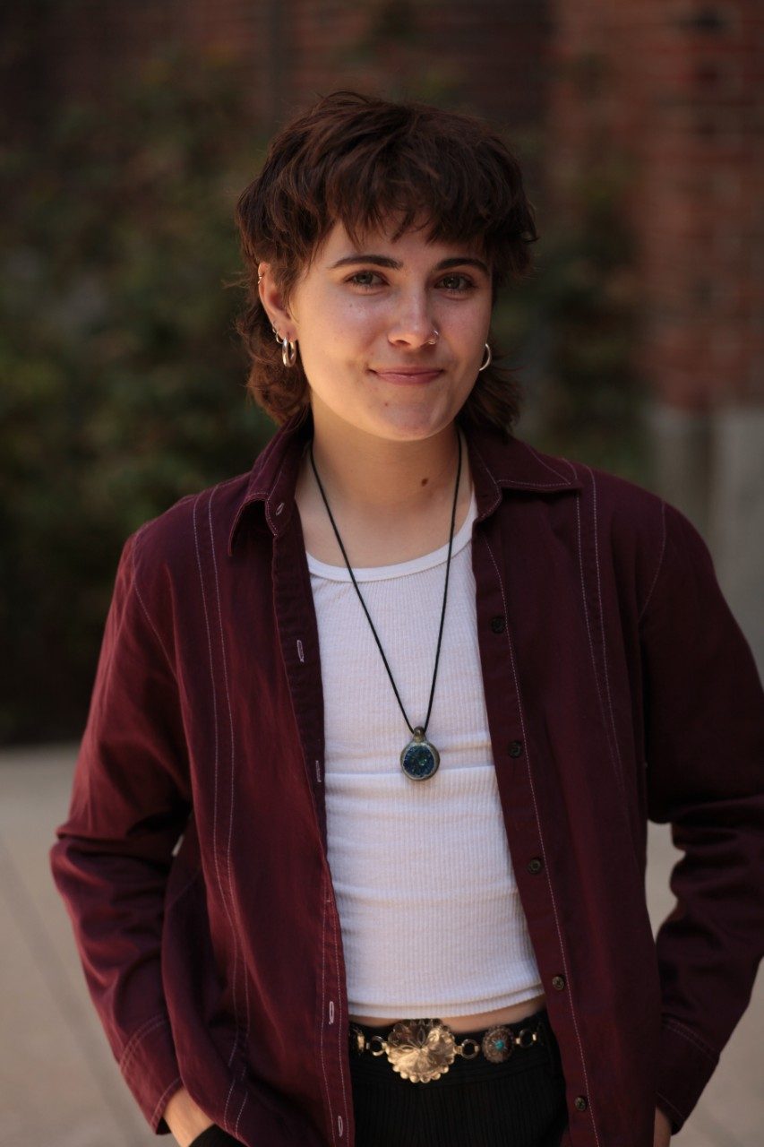 Photo of Juliet Bornholdt in marron jacket