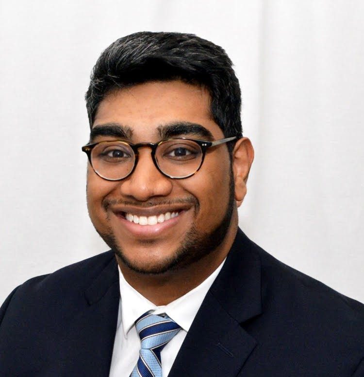 Headshot of Gautam, smiling