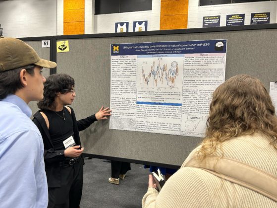 James Baybaş Presenting Poster at SNL