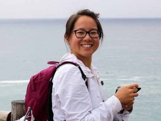 Image of woman Charlotte Chan by the ocean