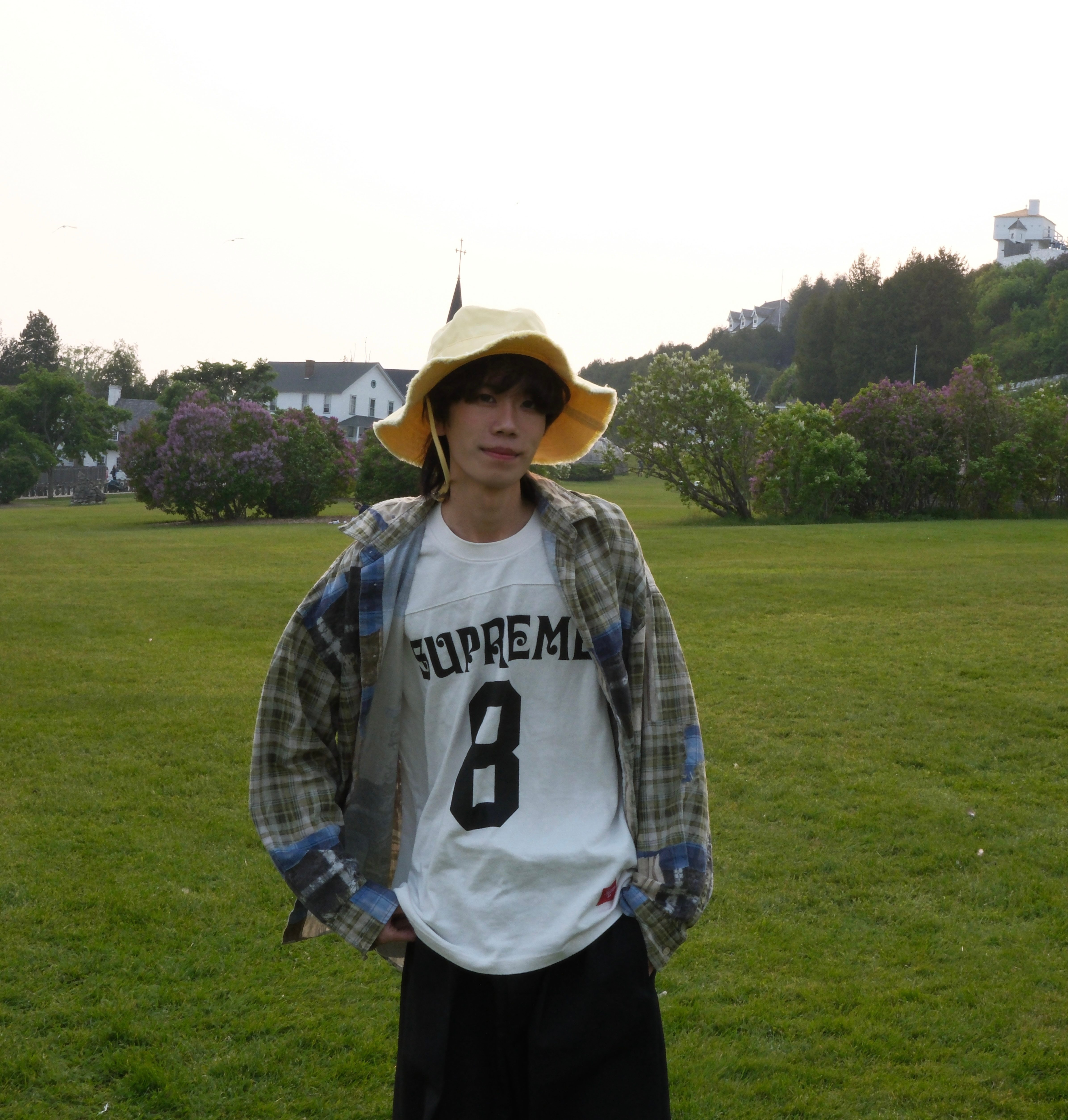 Picture of student standing in a field