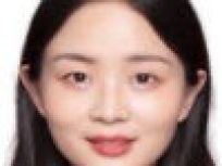 Research Fellow Xin Xie in a white collared shirt