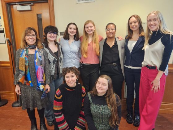 group of students with their professor