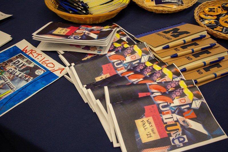 Cut and paste photo collage covered program guides fanned out on a table
