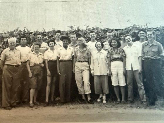 Black and white photo of a class standing outside