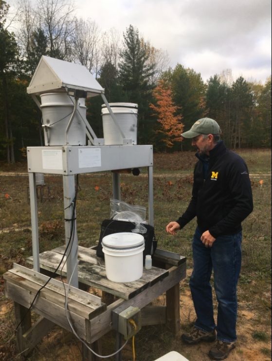 Person outside at a machine