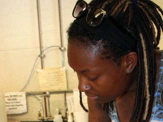 A student prepares samples for analysis
