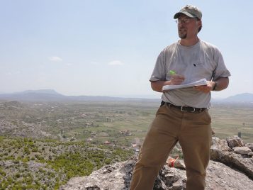Prof. Michael Galaty conducting field survey in Albania. Photo courtesy of Michael Galaty.