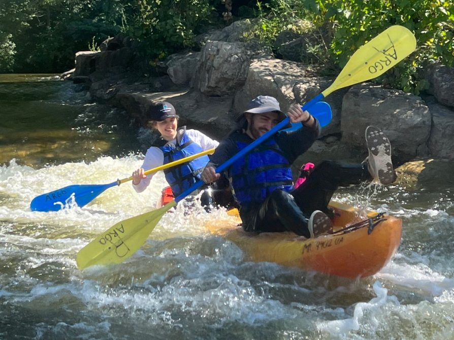 Anae Lemaire and Andrés Felipe Gonzalez Duran kayaking the rapids of the Huron River through Ann Arbor.