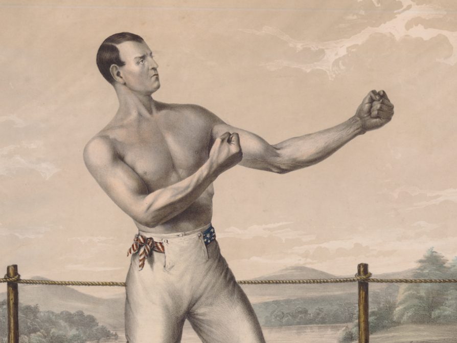 A 19th-century lithograph of American bare-knuckle boxer Tom Hyer. He stands shirtless in the ring with his fists upraised.