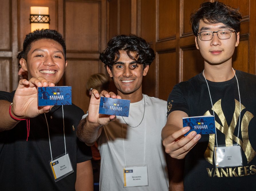 U-M students David Tecante, Sharjeel Sumbal, and Jack Hu pose for a photo.