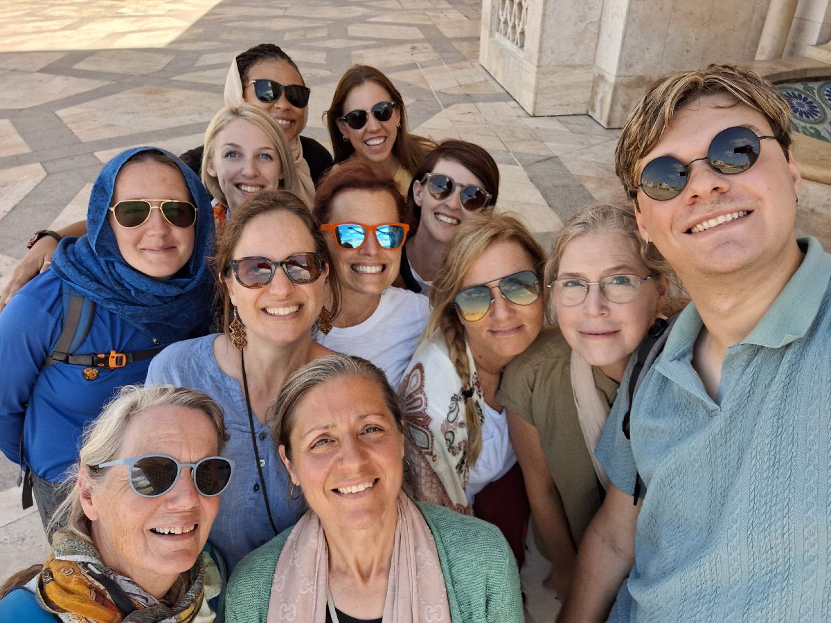Group shot of the 2024 GEEO participants at Hassan II Mosque in Casablanca