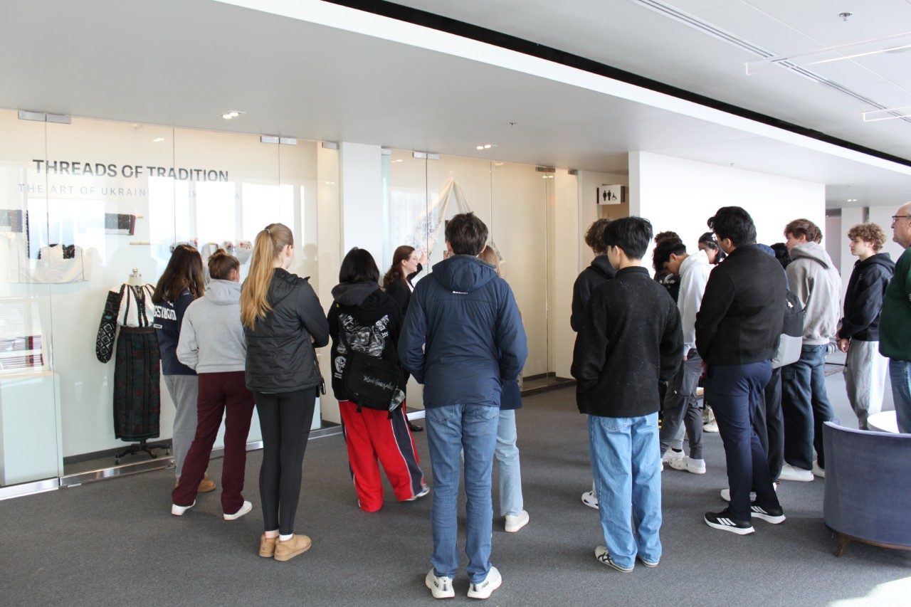 Students browsing exhibit.