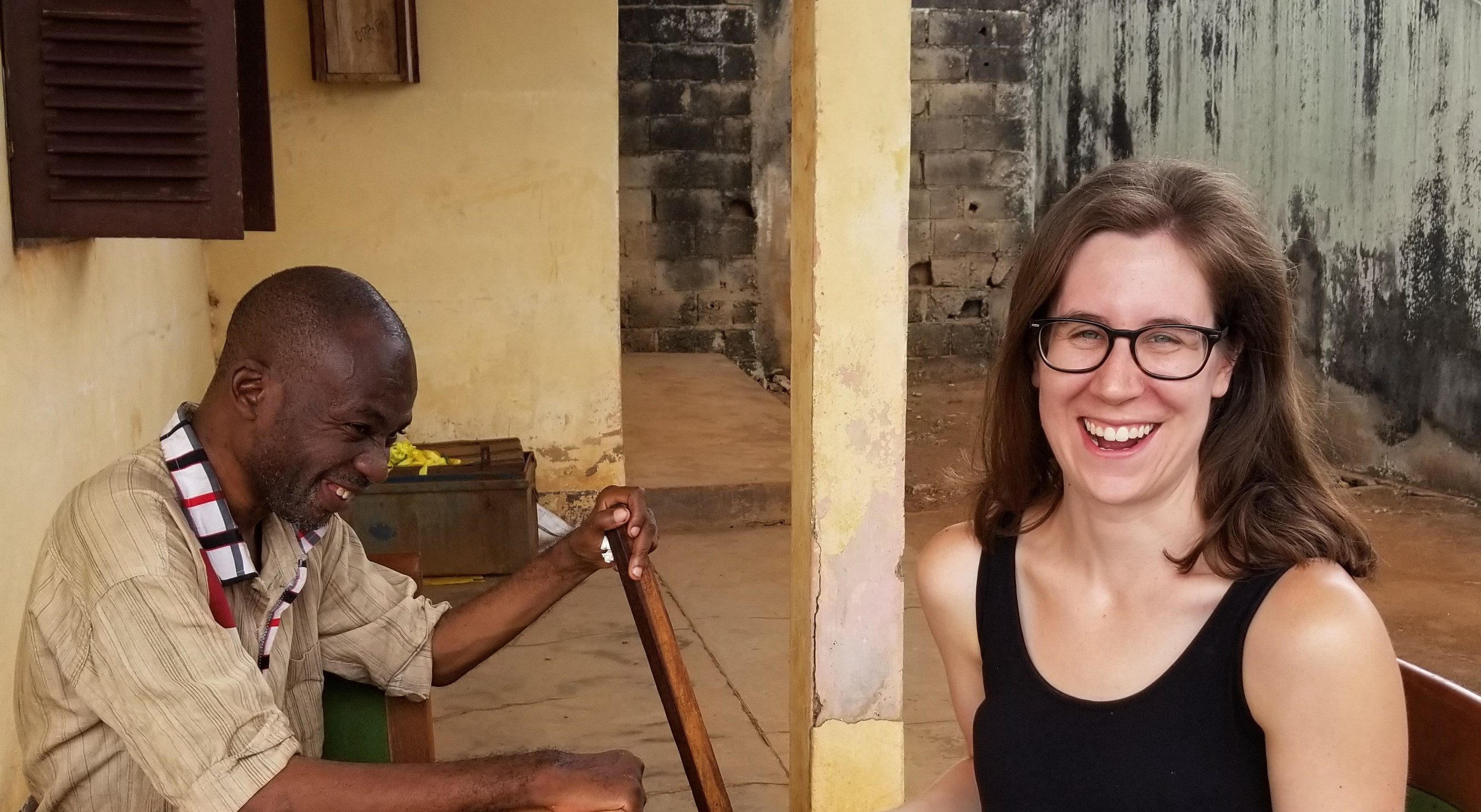 Image of Elizabeth Durham and her interlocutor, Leopold, enjoy a laugh during fieldwork in Cameroon (2018).