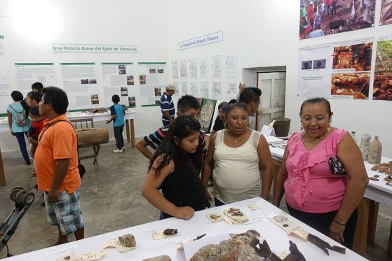People exploring an exhibition.