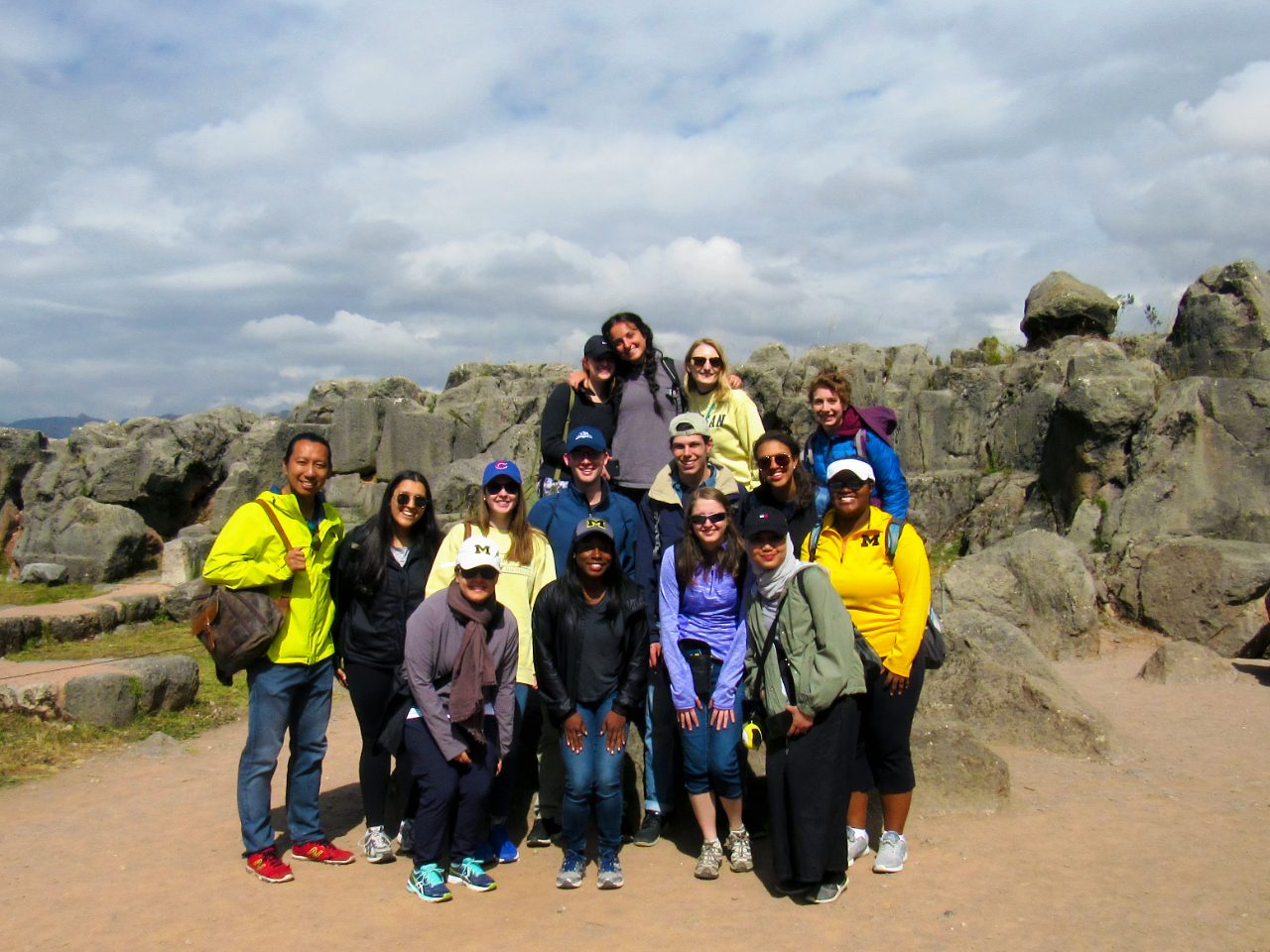 Faculty Howard Tsai and students snap a photo together in Peru on the Indigenous Communities vs. Globalization GCC in 2018.