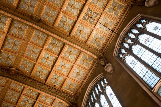 A high-valued reading room ceiling in orange light