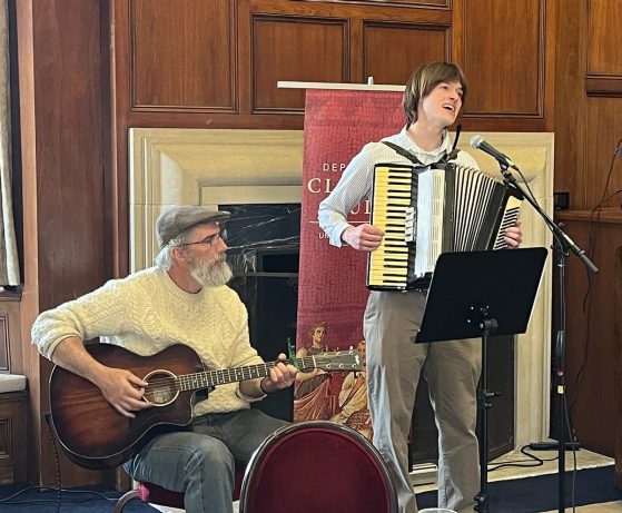 Anthony Asmus and his father perform his translation as a song.