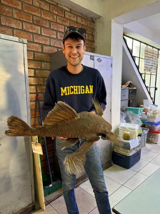 Ben Nicholas holds fish specimen