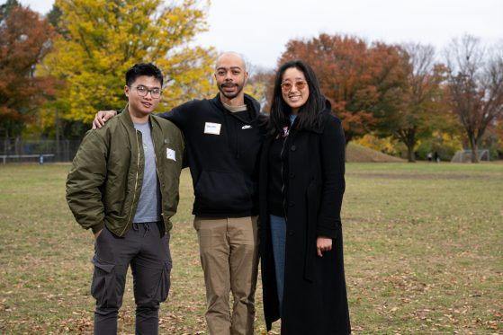 Donovan with two of his participants in Burns Park gathering 
