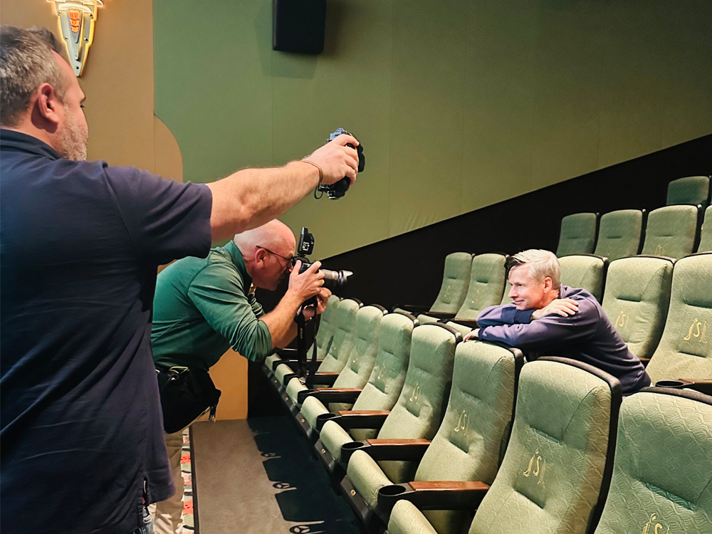 The Detroit News reporter and photographer taking photos of John Cameron Mitchell inside State Theatre.