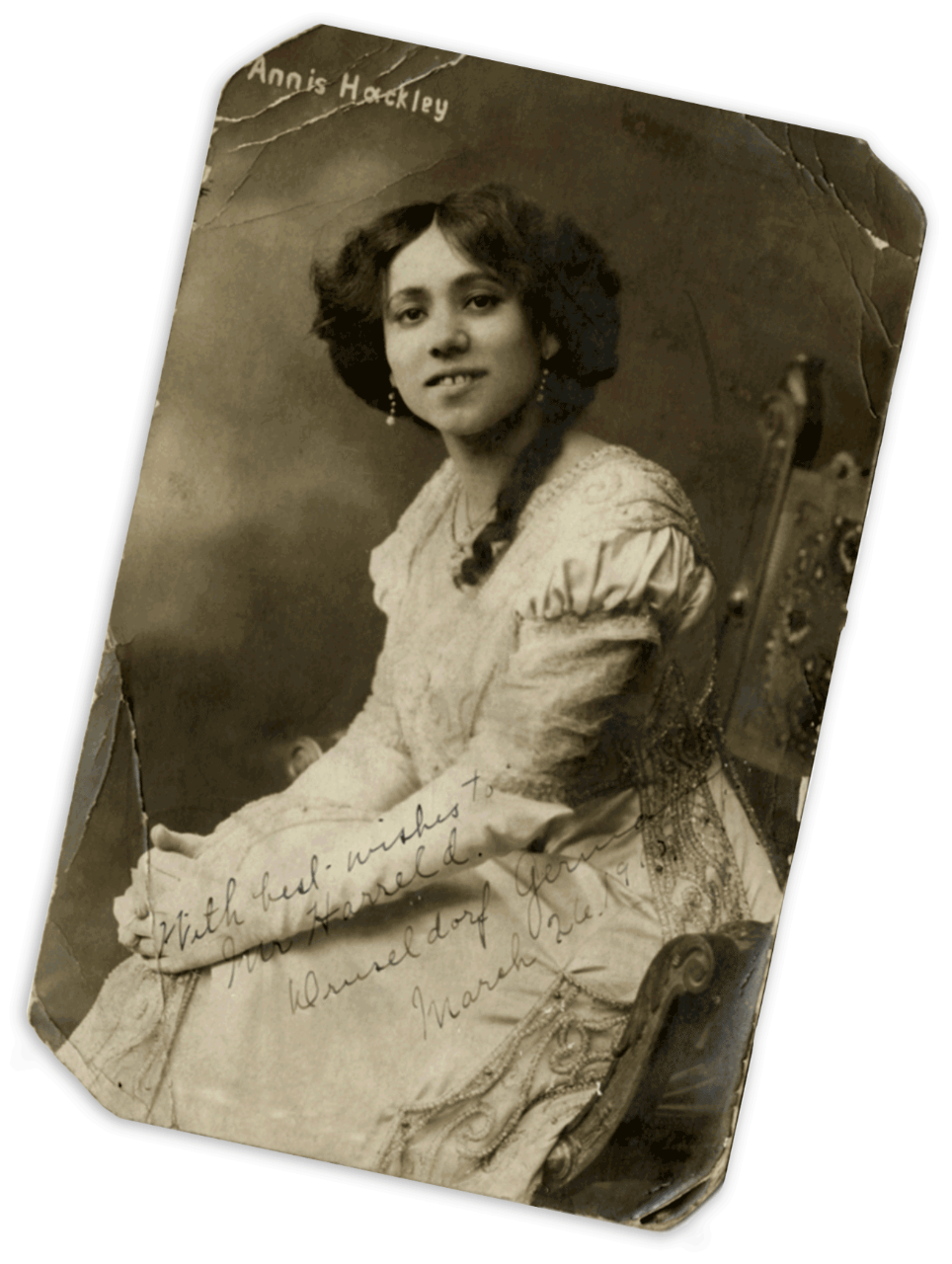 A sepia-toned photograph of opera singer Annis Hackley.